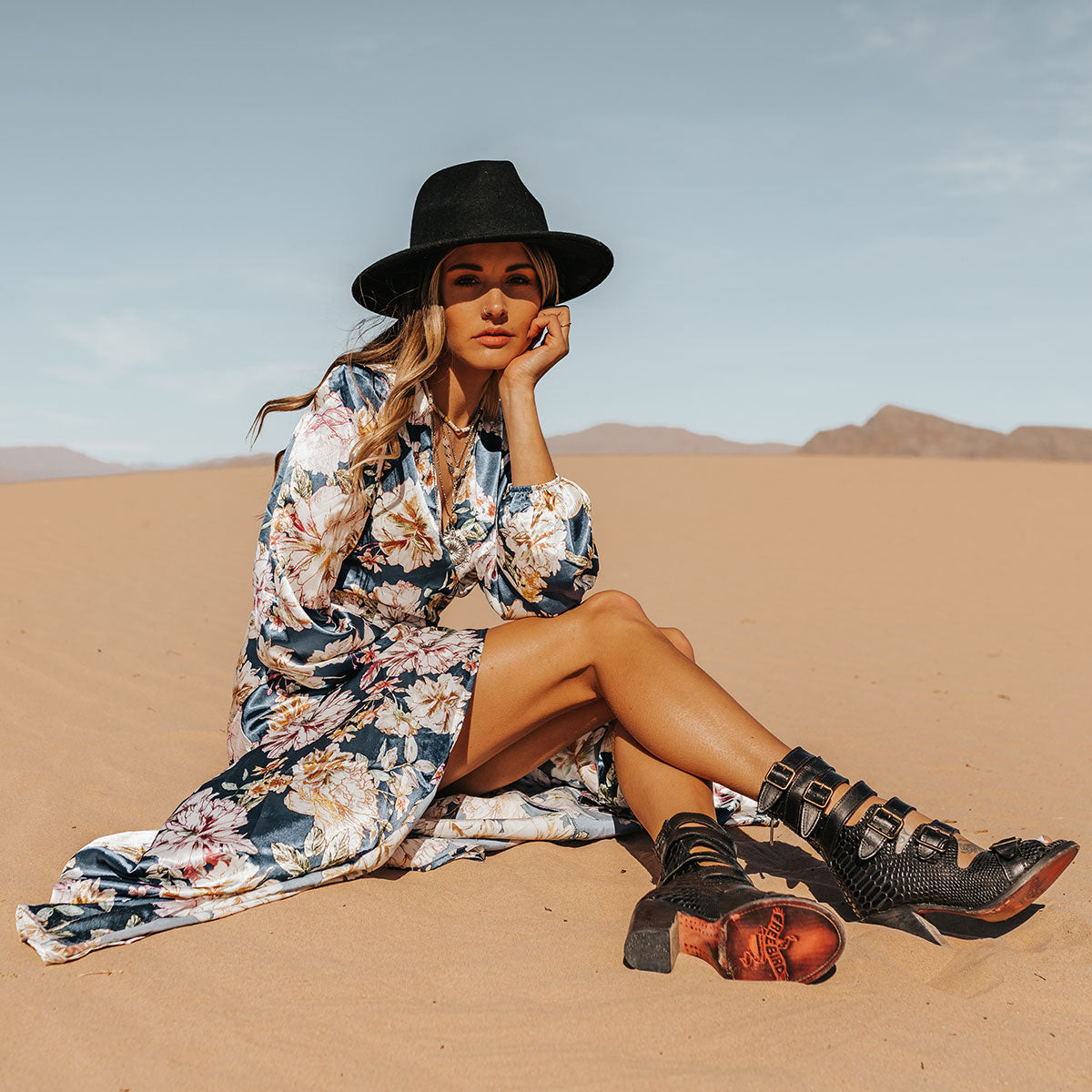FREEBIRD women's Bond black snake sandal with fashion straps and stacked heel lifestyle image