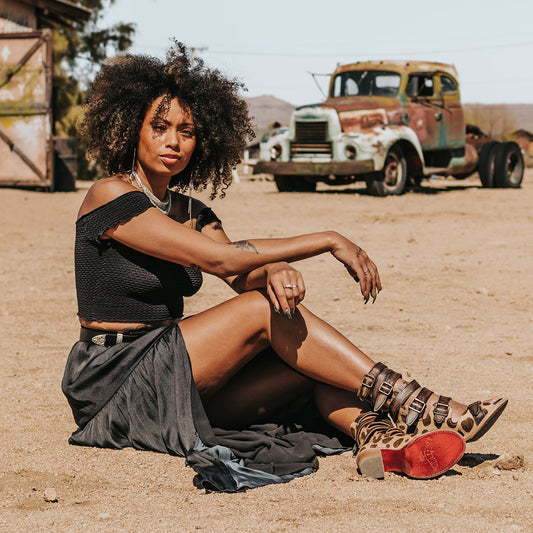 FREEBIRD women's Bond leopard sandal with fashion straps and stacked heel lifestyle image