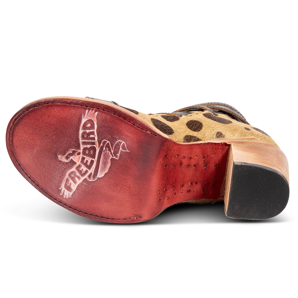Leather sole imprinted with FREEBIRD on women's Bond leopard sandal