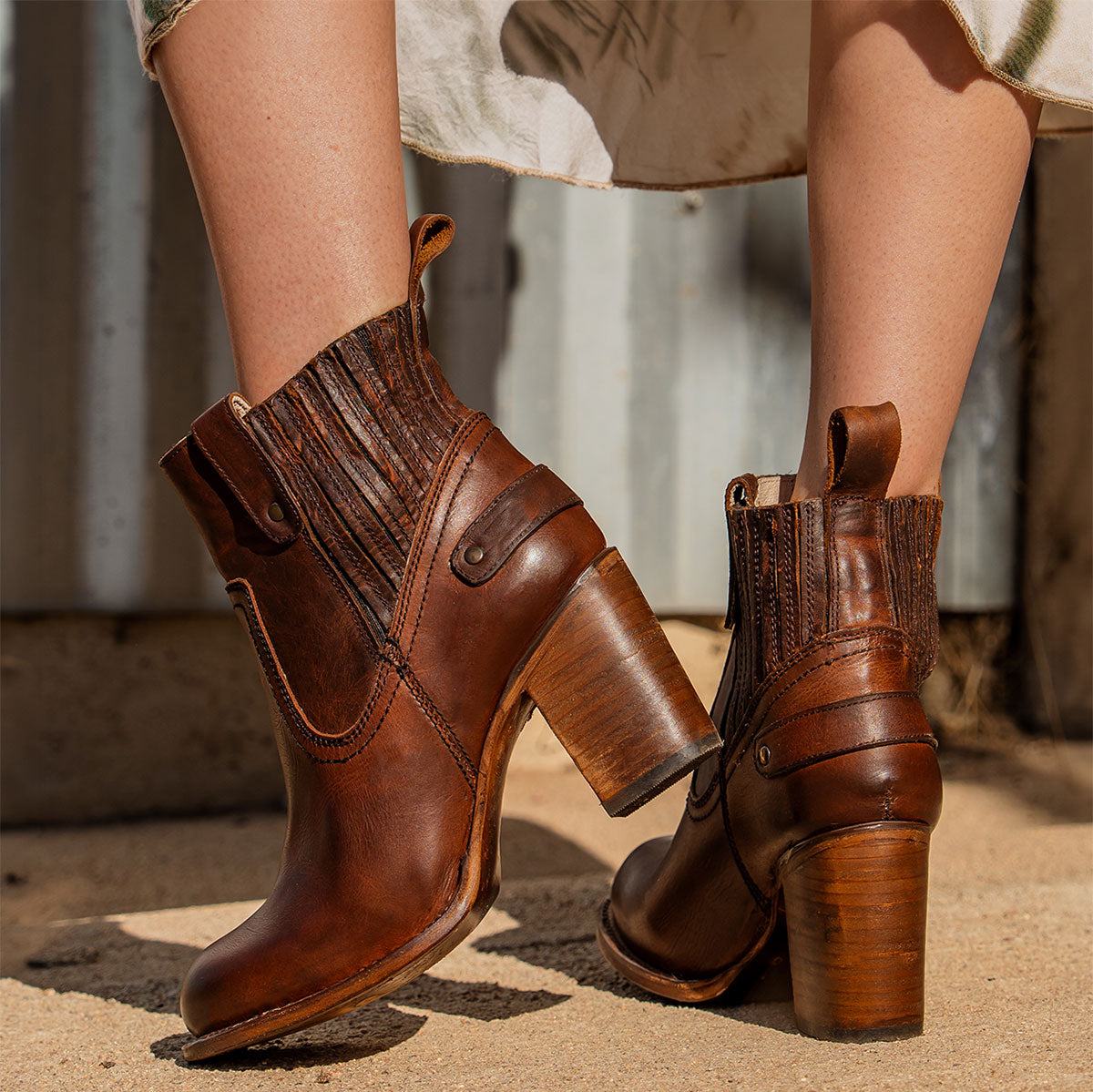Freebird women's BOWIN cognac leather bootie with gore flex detailing, high heel and leather pull strap