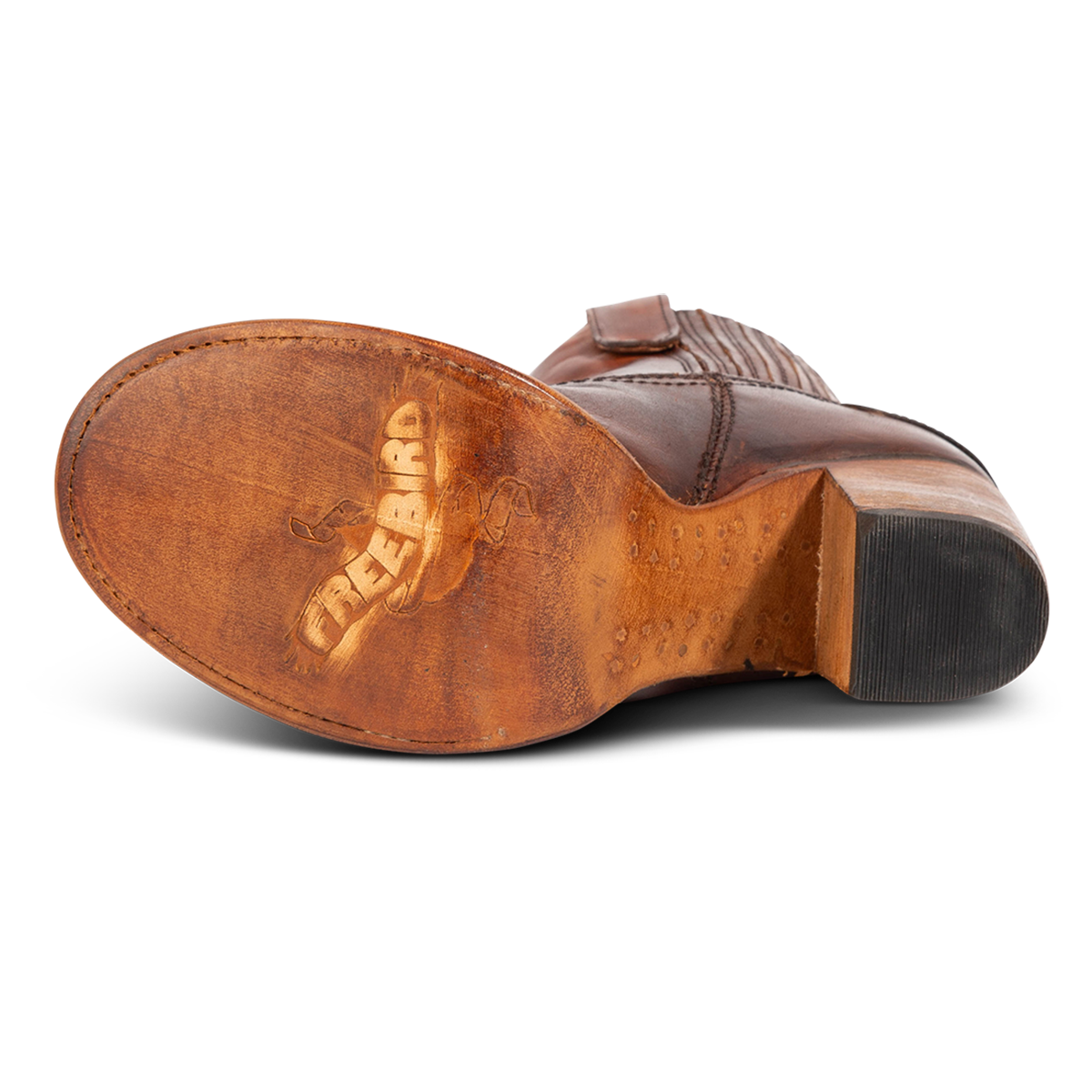Leather sole imprinted with FREEBIRD on women's BOWIN cognac leather bootie