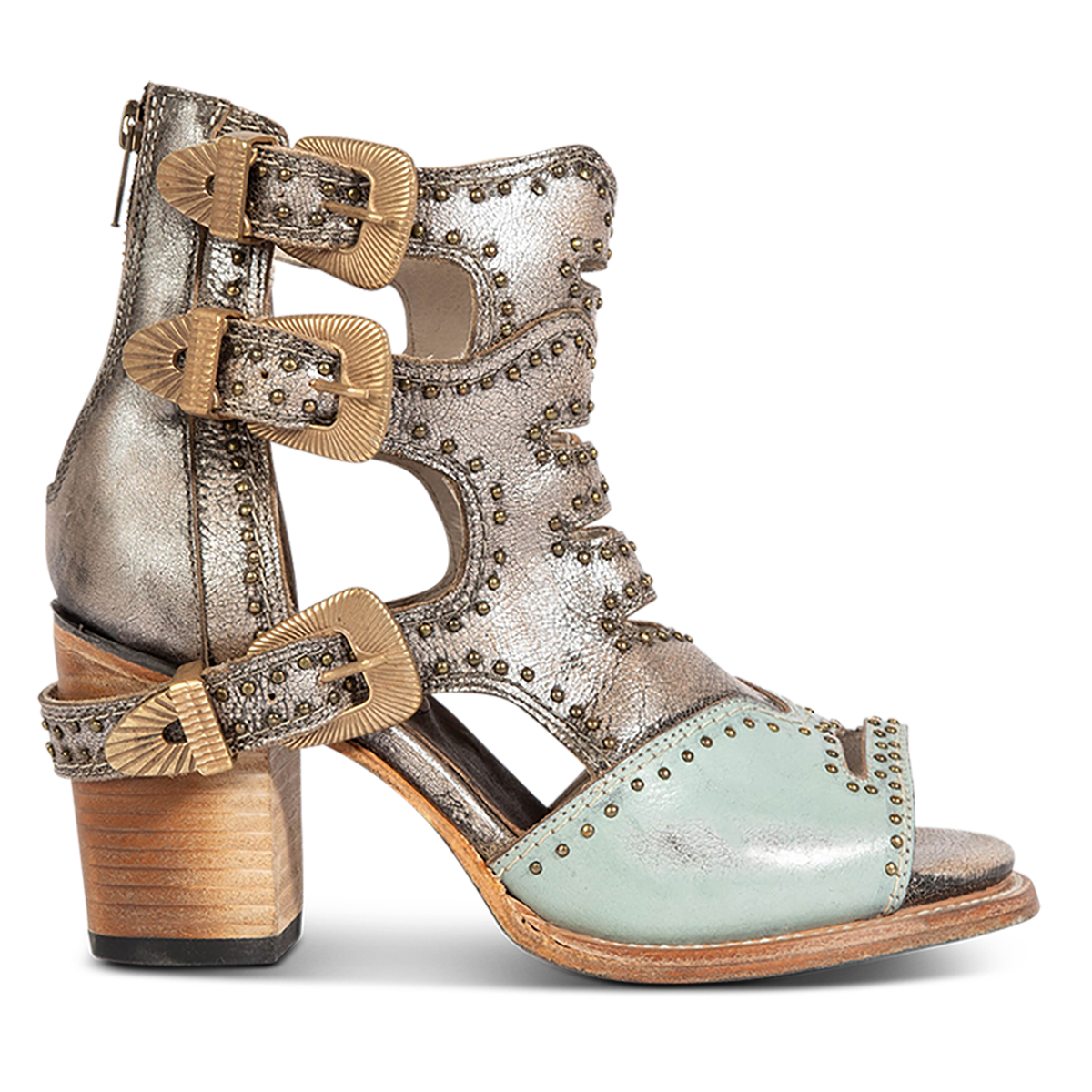 FREEBIRD women's Bradshaw blue/silver two-toned leather sandal with adjustable gold buckle hardware, stud embellishments and cut out detailing. Finished on a lifted high heel. 