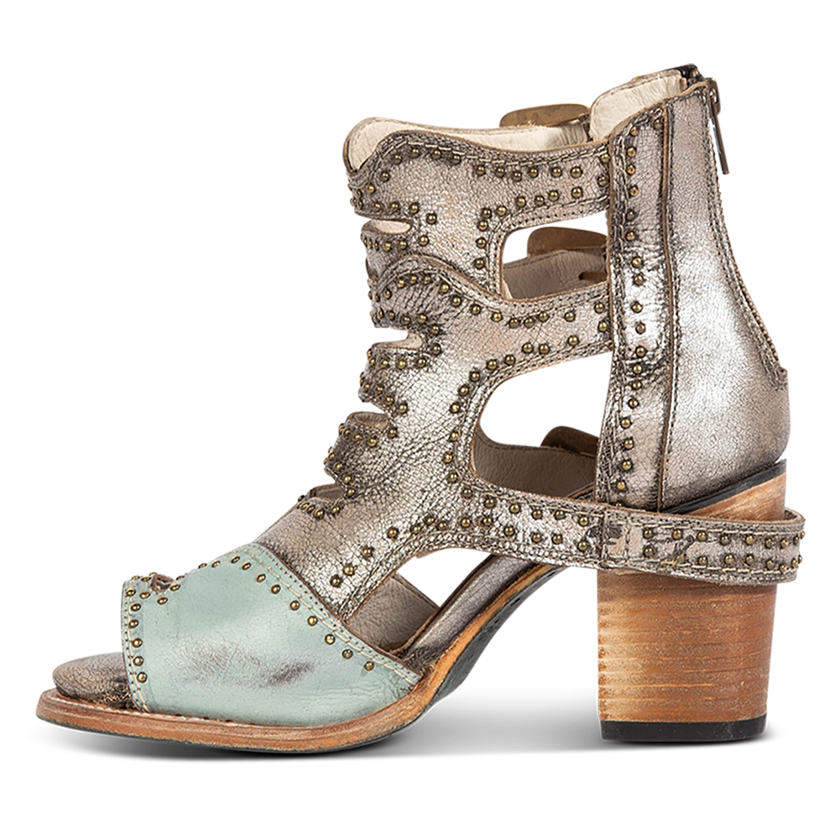 Inside view showing FREEBIRD women's Bradshaw blue/silver two-toned leather sandal with a working brass zipper, stud embellishments and cut out detailing. Finished on a lifted high heel. 