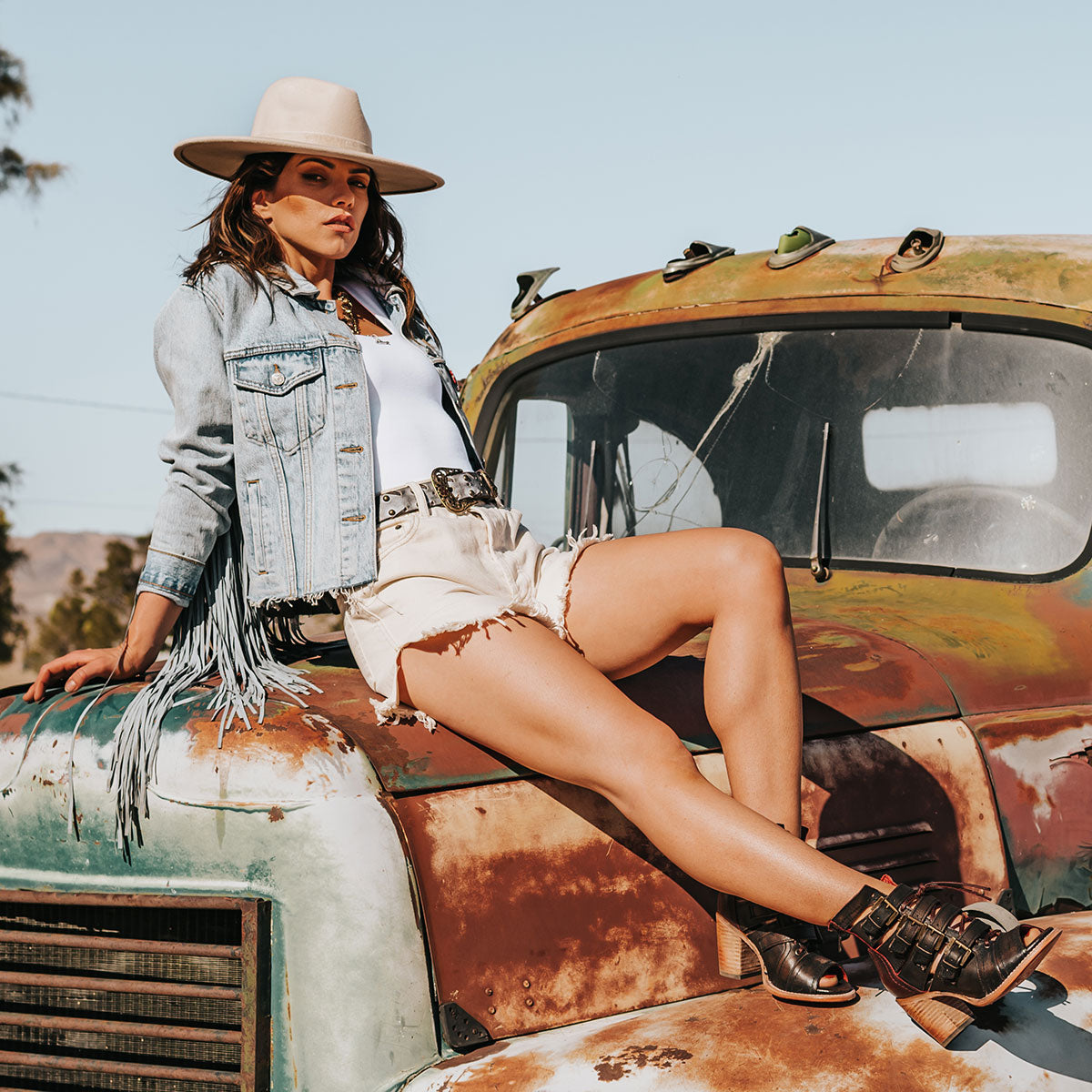 FREEBIRD women's Braeden black multi sandal with adjustable straps and leather lacing detailing lifestyle image
