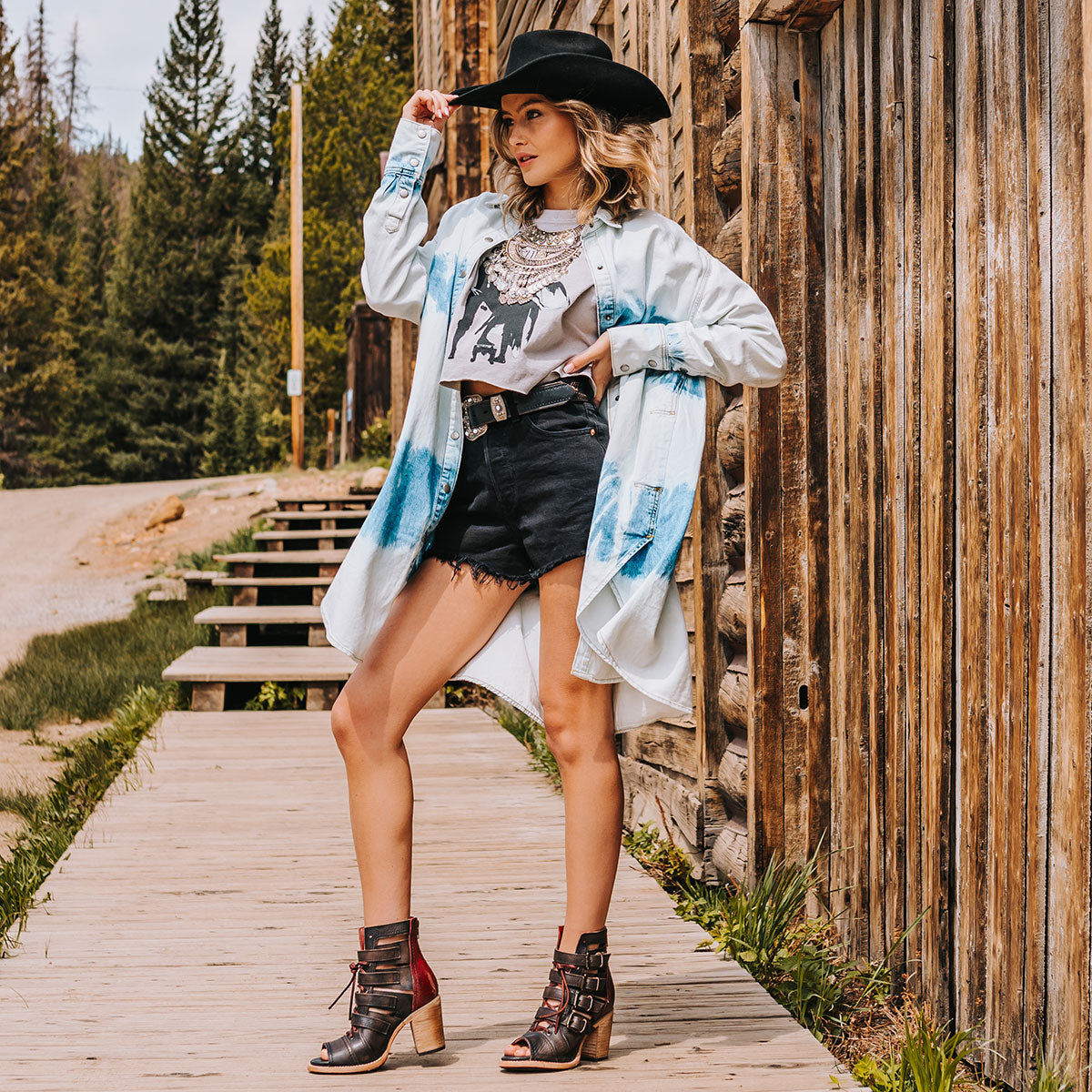 FREEBIRD women's Braeden black multi sandal with adjustable straps and leather lacing detailing lifestyle image