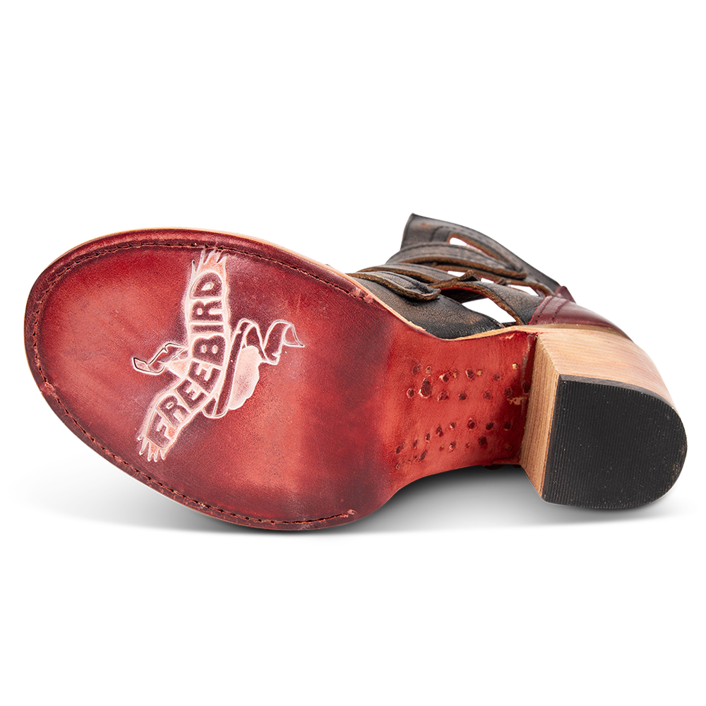 Leather sole imprinted with FREEBIRD on women's Braeden black multi sandal 
