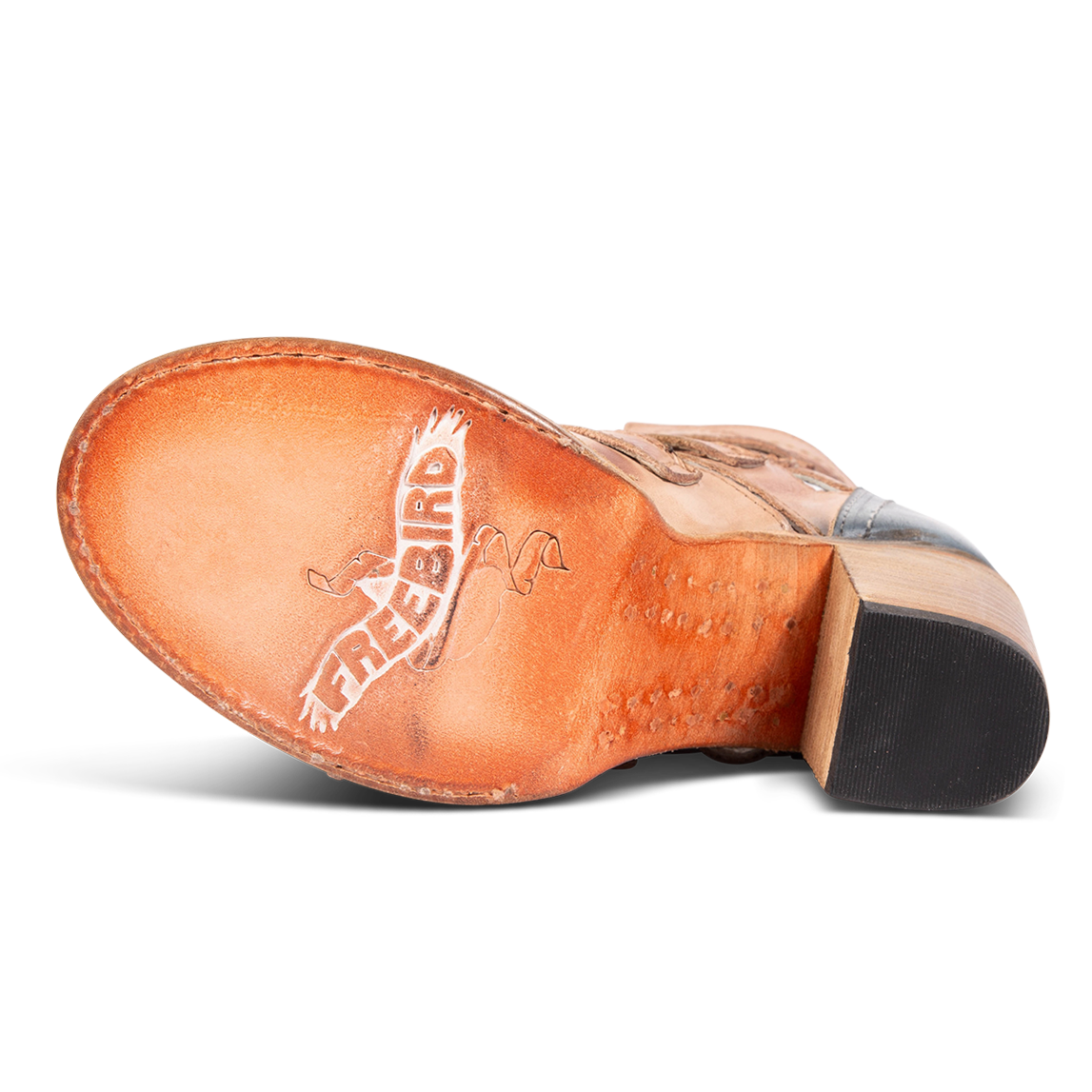 Leather sole imprinted with FREEBIRD on women's Braeden blush sandal 