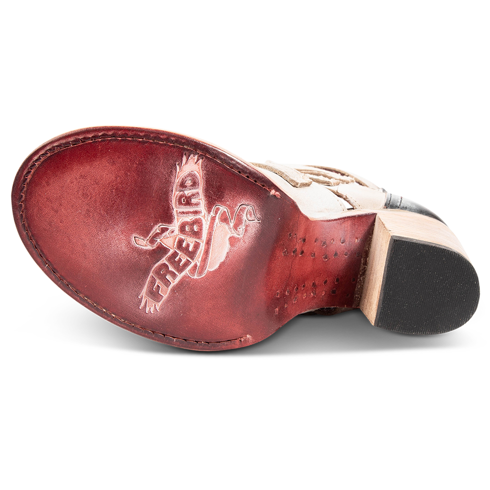 Leather sole imprinted with FREEBIRD on women's Braeden ice sandal 