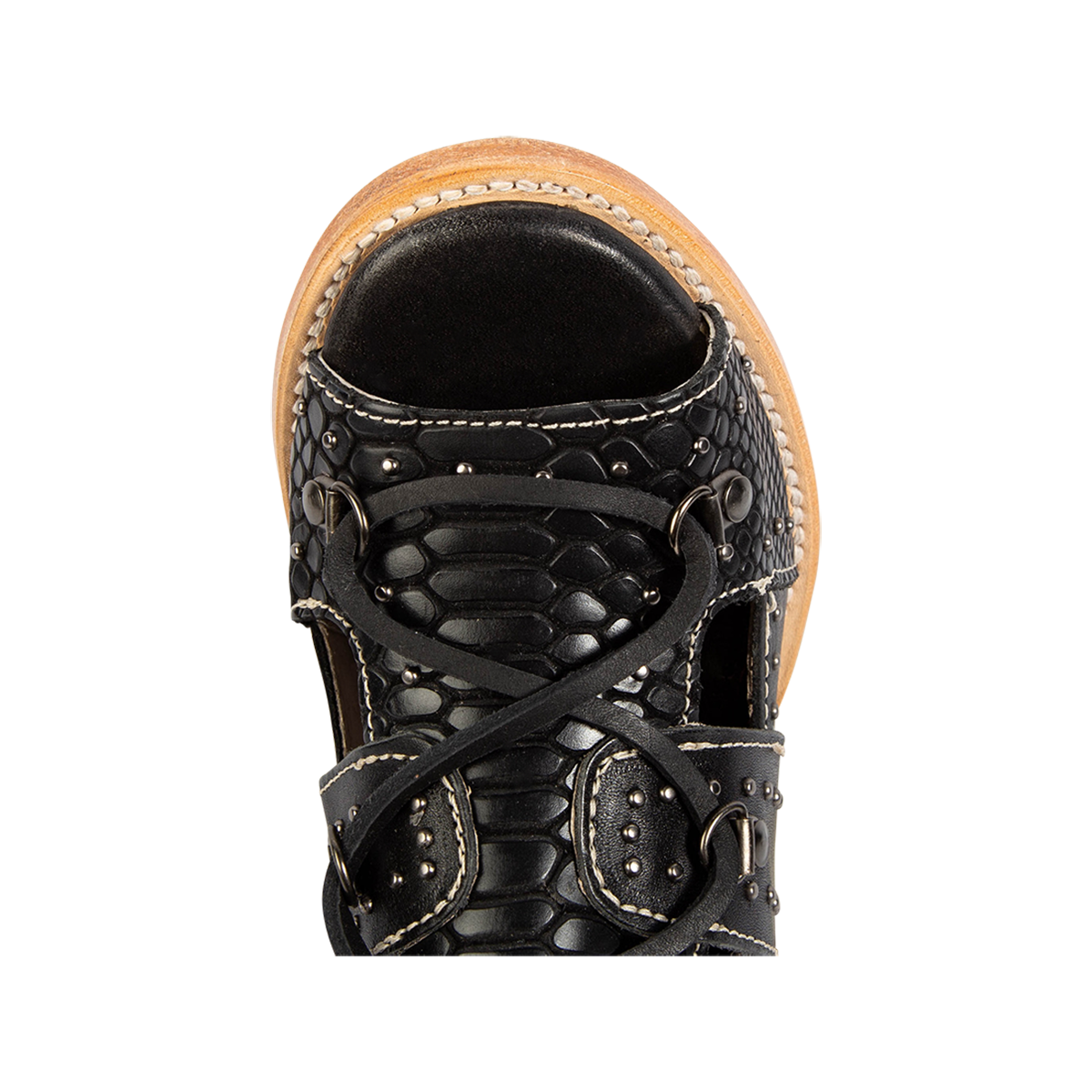 Top view showing an open, rounded toe and criss cross leather lacing on FREEBIRD women's Brandy black snake embossed leather sandal