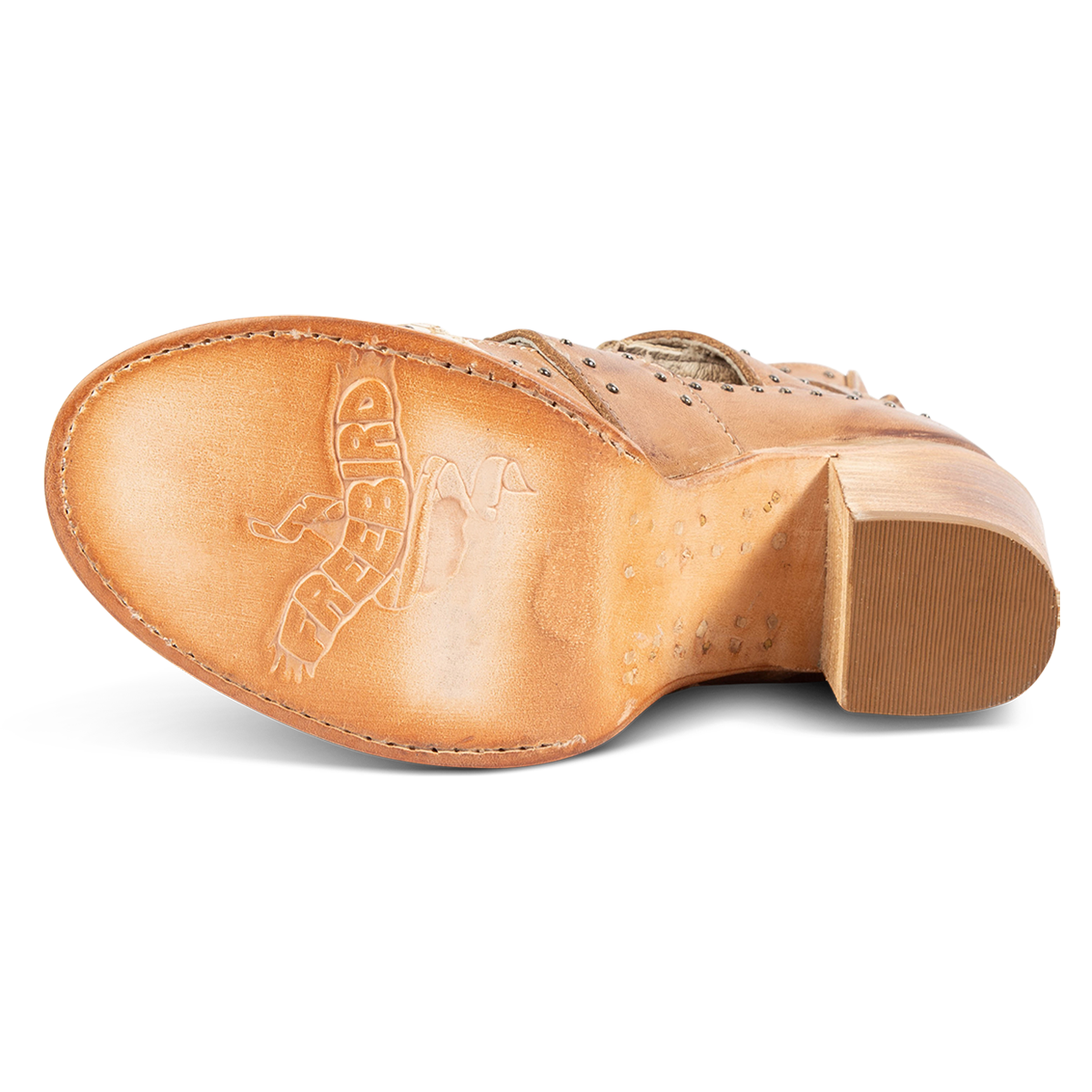 Leather sole imprinted with FREEBIRD on women's Brandy white snake embossed leather sandal 