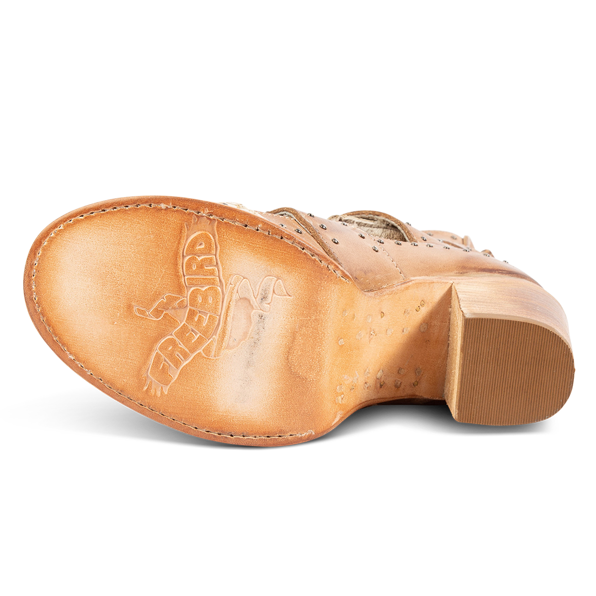 Leather sole imprinted with FREEBIRD on women's Brandy white snake embossed leather sandal