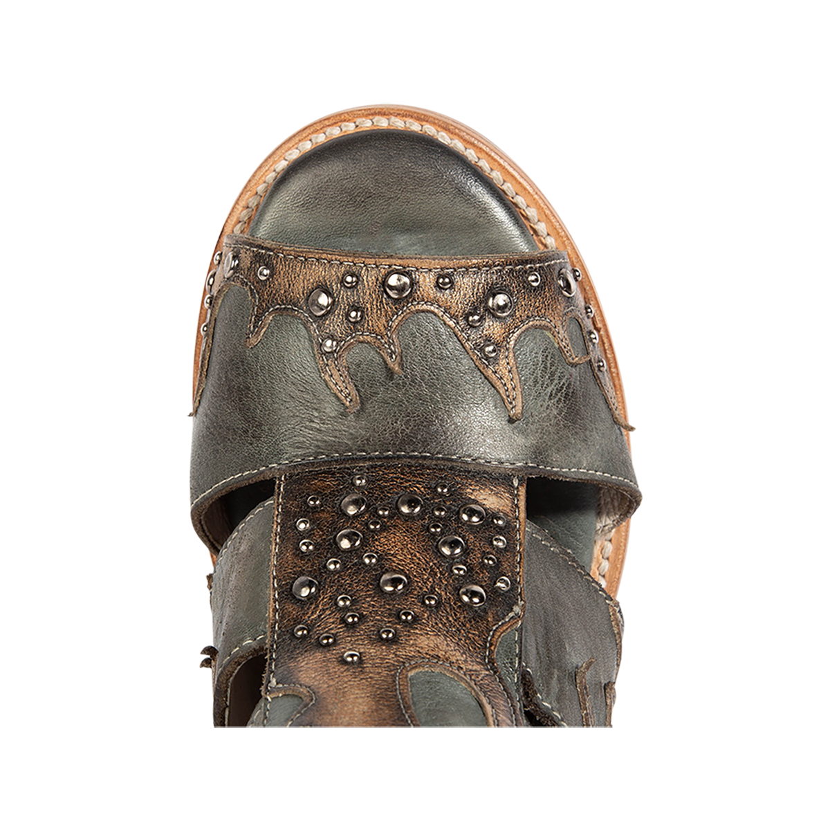 Top view showing a round toe construction and silver stud embellishments on FREEBIRD women's Brooke blue leather sandal