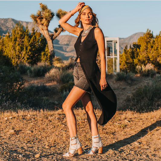 FREEBIRD women's Brooke white leather sandal with an adjustable leather ankle strap, flame leather overlays and an open toe silhouette lifestyle
