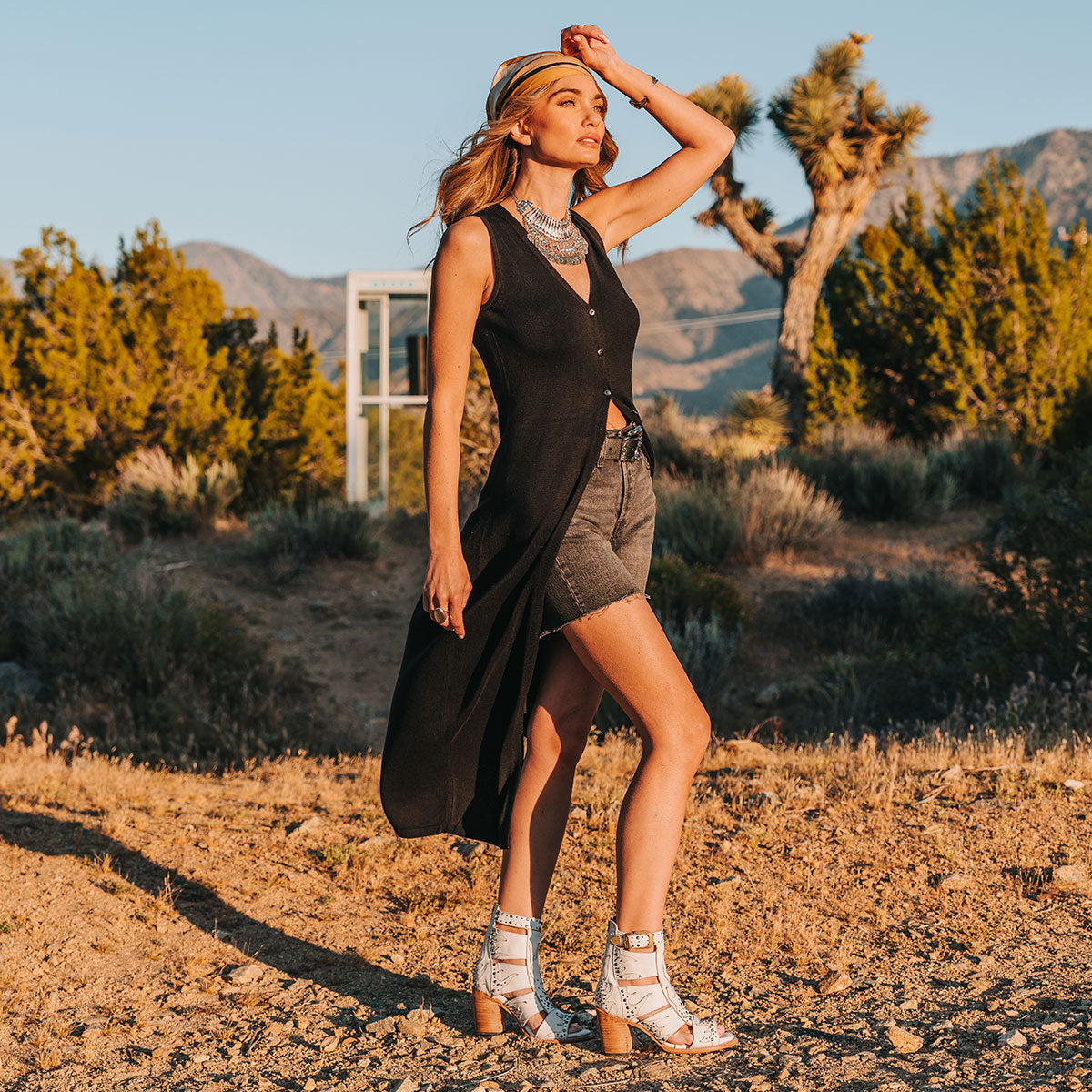 FREEBIRD women's Brooke white leather sandal with an adjustable leather ankle strap, flame leather overlays and an open toe silhouette lifestyle