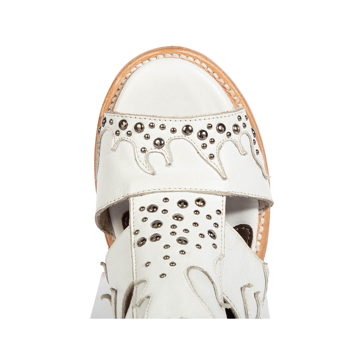 Top view showing a round toe construction and silver stud embellishments on FREEBIRD women's Brooke white leather sandal