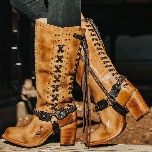 FREEBIRD women's Buck tan leather tall boot with shaft lacing and stud detailing