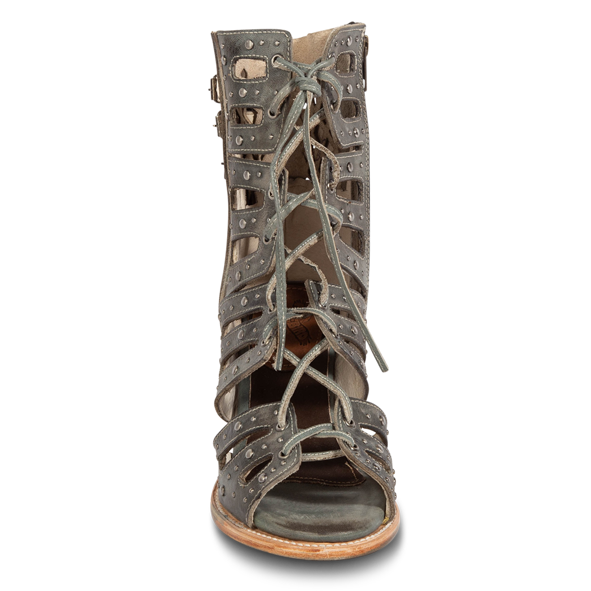Front view showing an open silhouette and leather lace front closure on FREEBIRD women's BUD blue leather sandals