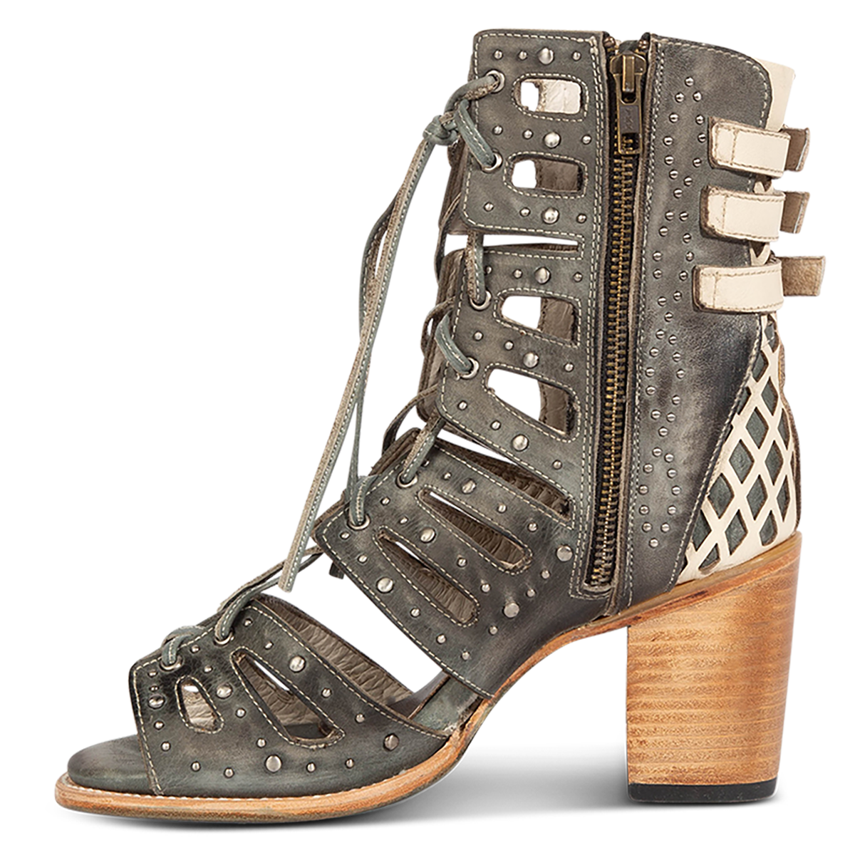 Inside view showing FREEBIRD women's BUD blue leather sandal with laser-cut heel paneling, front leather lacing, silver stud detailing and a lifted heel