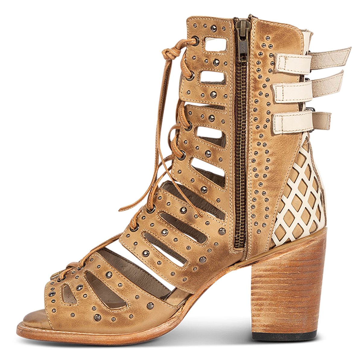 Inside view showing FREEBIRD women's BUD tan leather sandal with laser-cut heel paneling, front leather lacing, silver stud detailing and a lifted heel