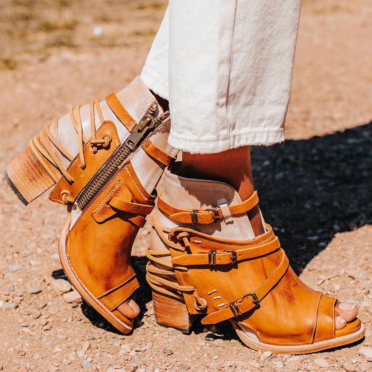 FREEBIRD women's Carterr tan multi sandal with back lacing and a front dip