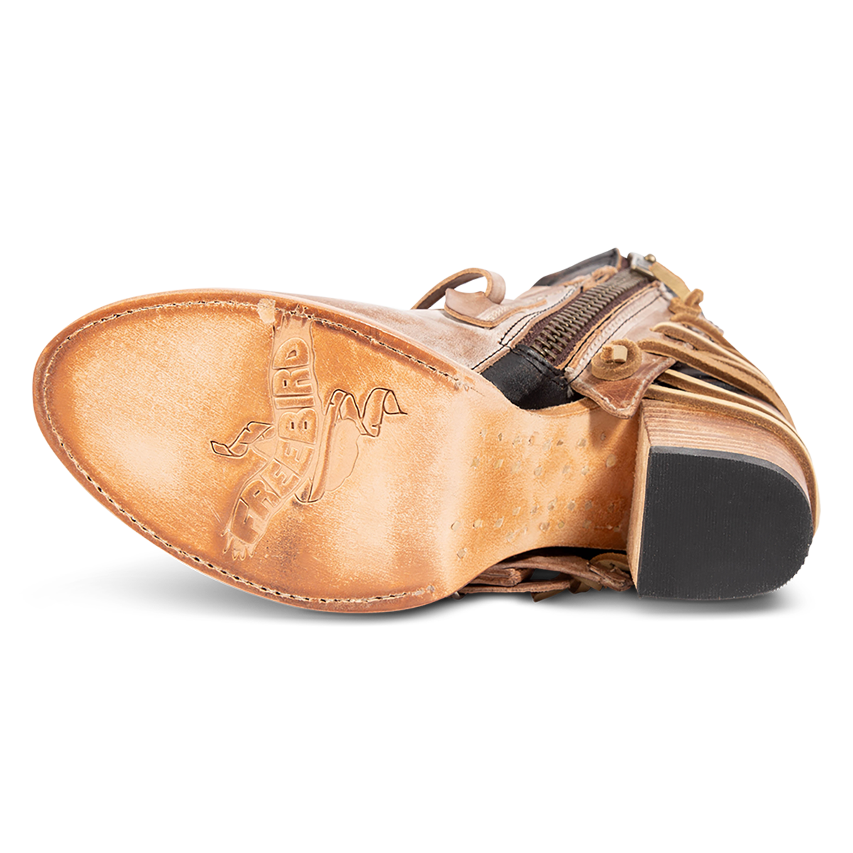 Leather sole imprinted with FREEBIRD on women's Carterr taupe sandal