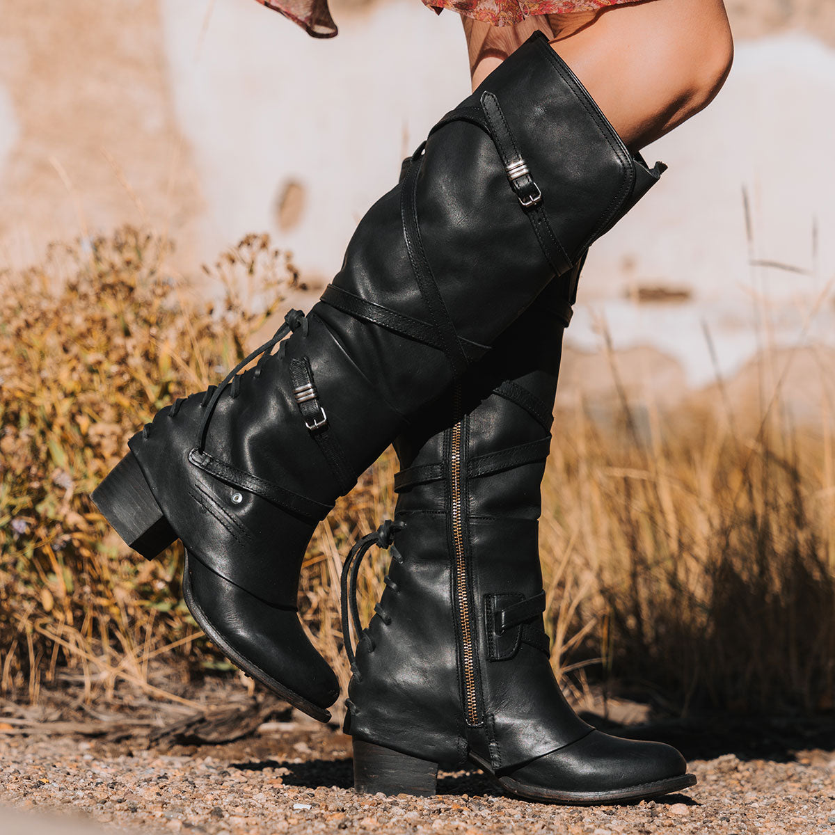 FREEBIRD women's Cassius black leather strappy tall boot with back lacing ankle overlay