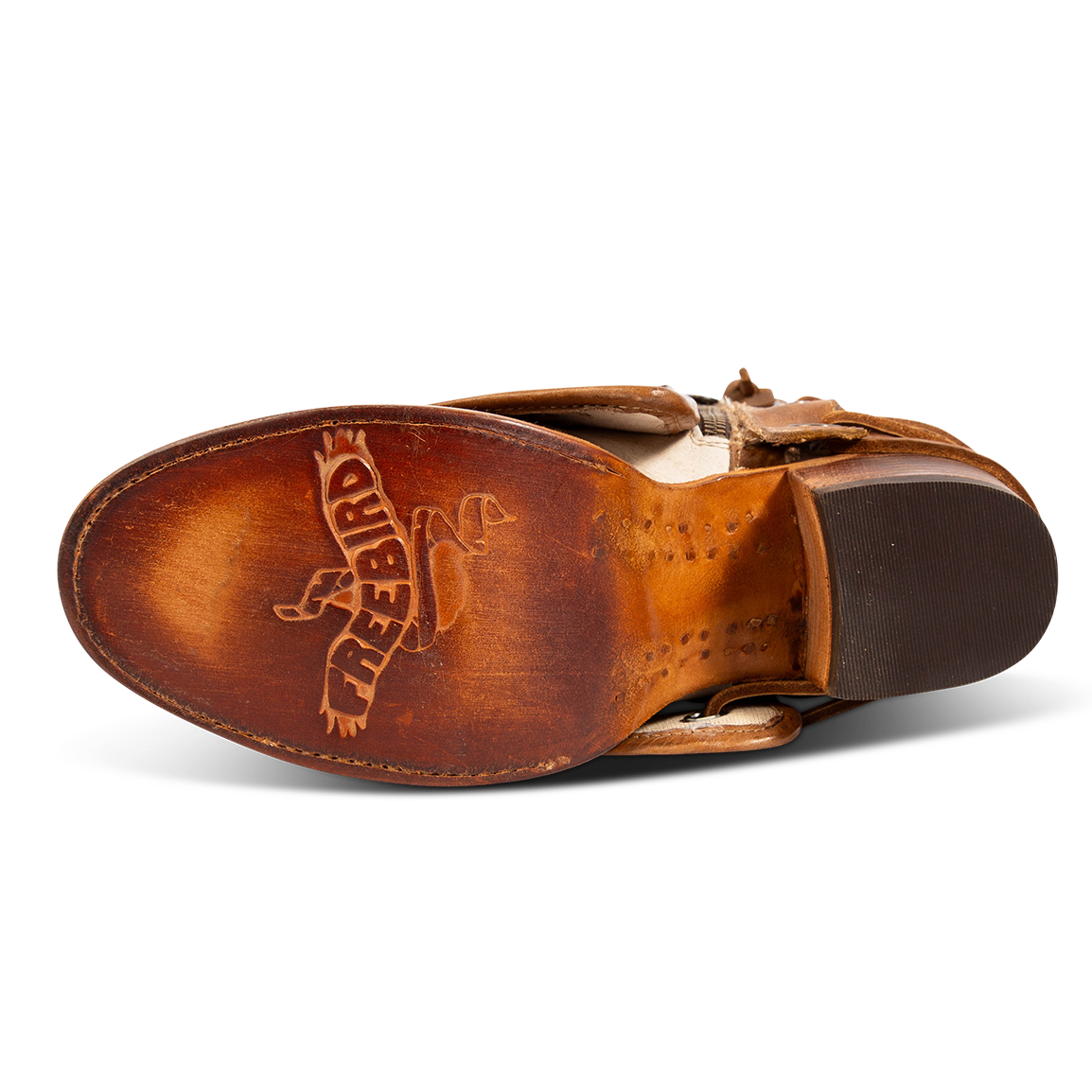 Leather sole imprinted with FREEBIRD on women's Cedrick tan leather bootie