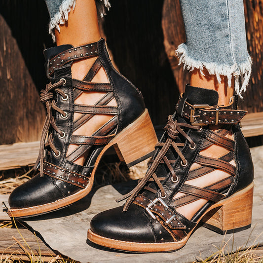 FREEBIRD women's Cheyenne black multi laser cut criss-cross leather lace up front silver buckle detail ankle bootie