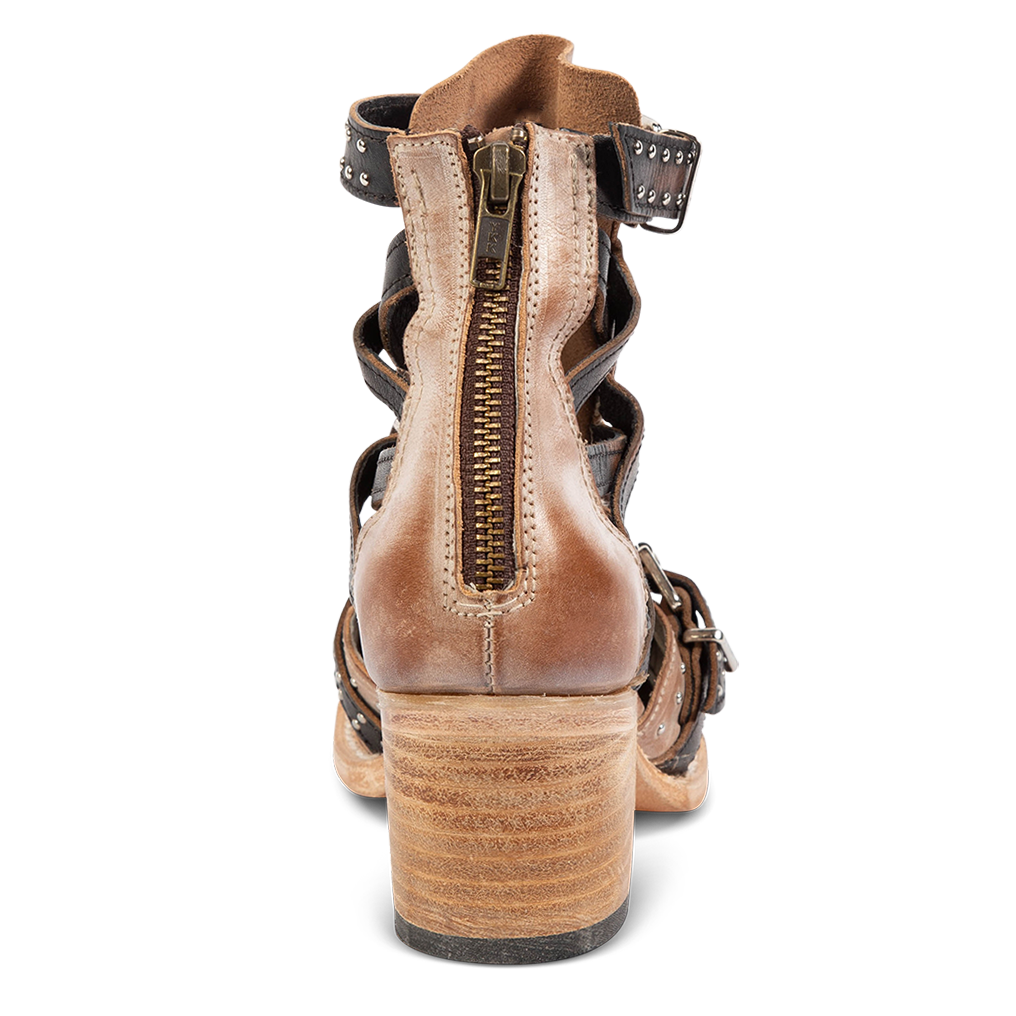 Back view showing working brass zip closure on FREEBIRD women's Cheyenne taupe multi bootie