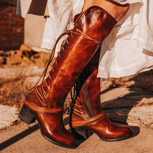 FREEBIRD women’s Coal cognac leather knee high adjustable back lacing boot 