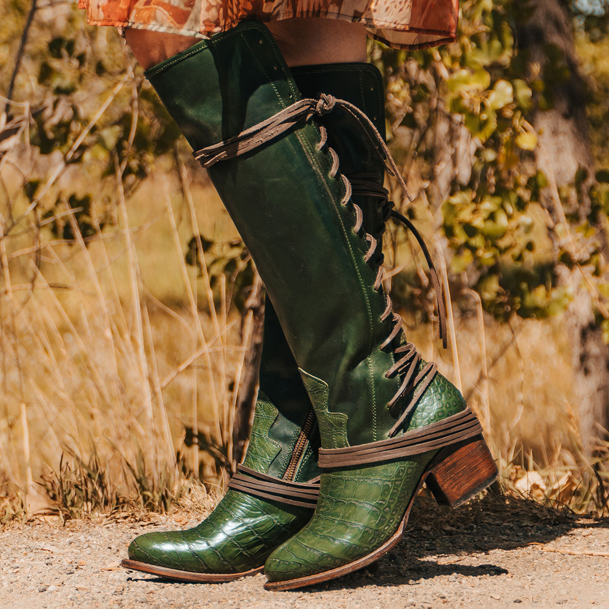 Front view showing shaft stitch detailing and wrap around lacing on FREEBIRD women's Coal green multi 