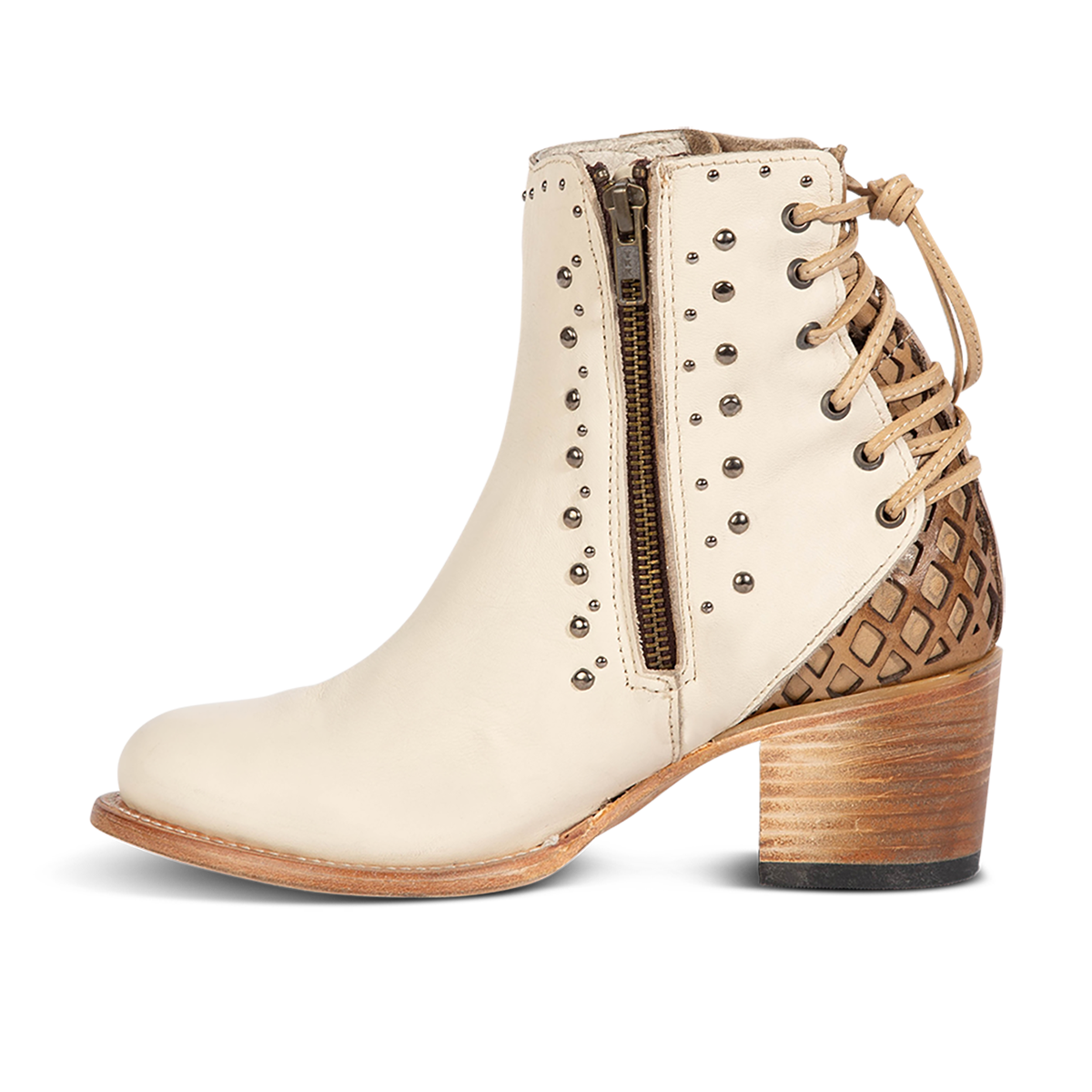 Inside view showing FREEBIRD women's Columbia white two toned leather bootie with laser cut back panel detailing and an inside brass zip closure