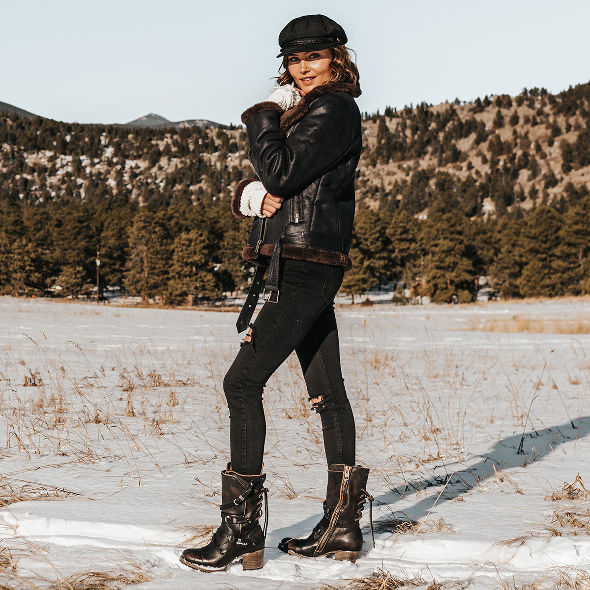 FREEBIRD women’s Cora black slouchy back lacing leather boot with adjustable straps and buckles lifestyle image