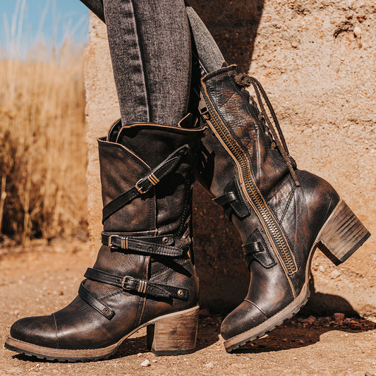 FREEBIRD women’s Cora black slouchy back lacing leather boot with adjustable straps and buckles
