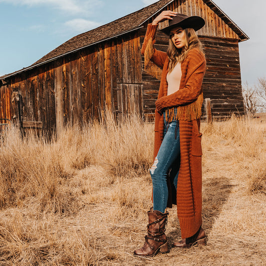 FREEBIRD women’s Cora brown slouchy back lacing leather boot with adjustable straps and buckles lifestyle