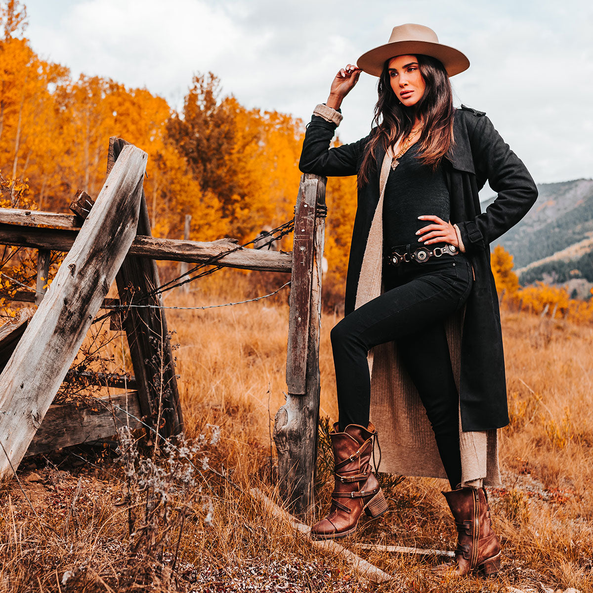 FREEBIRD women’s Cora brown slouchy back lacing leather boot with adjustable straps and buckles lifestyle image