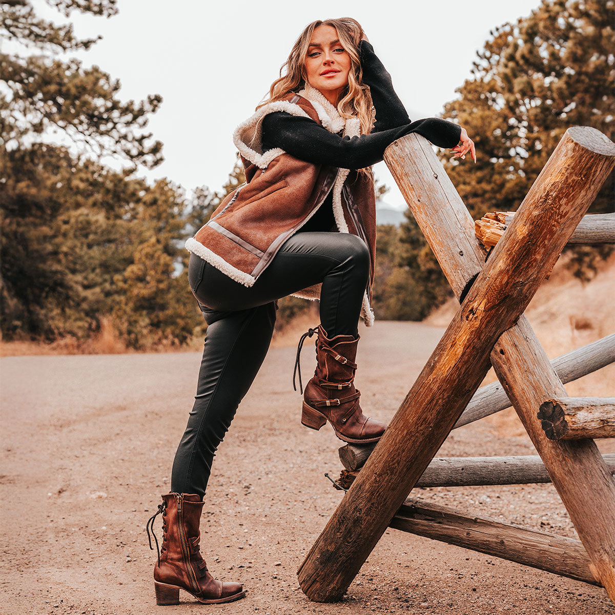 FREEBIRD women’s Cora brown slouchy back lacing leather boot with adjustable straps and buckles lifestyle image