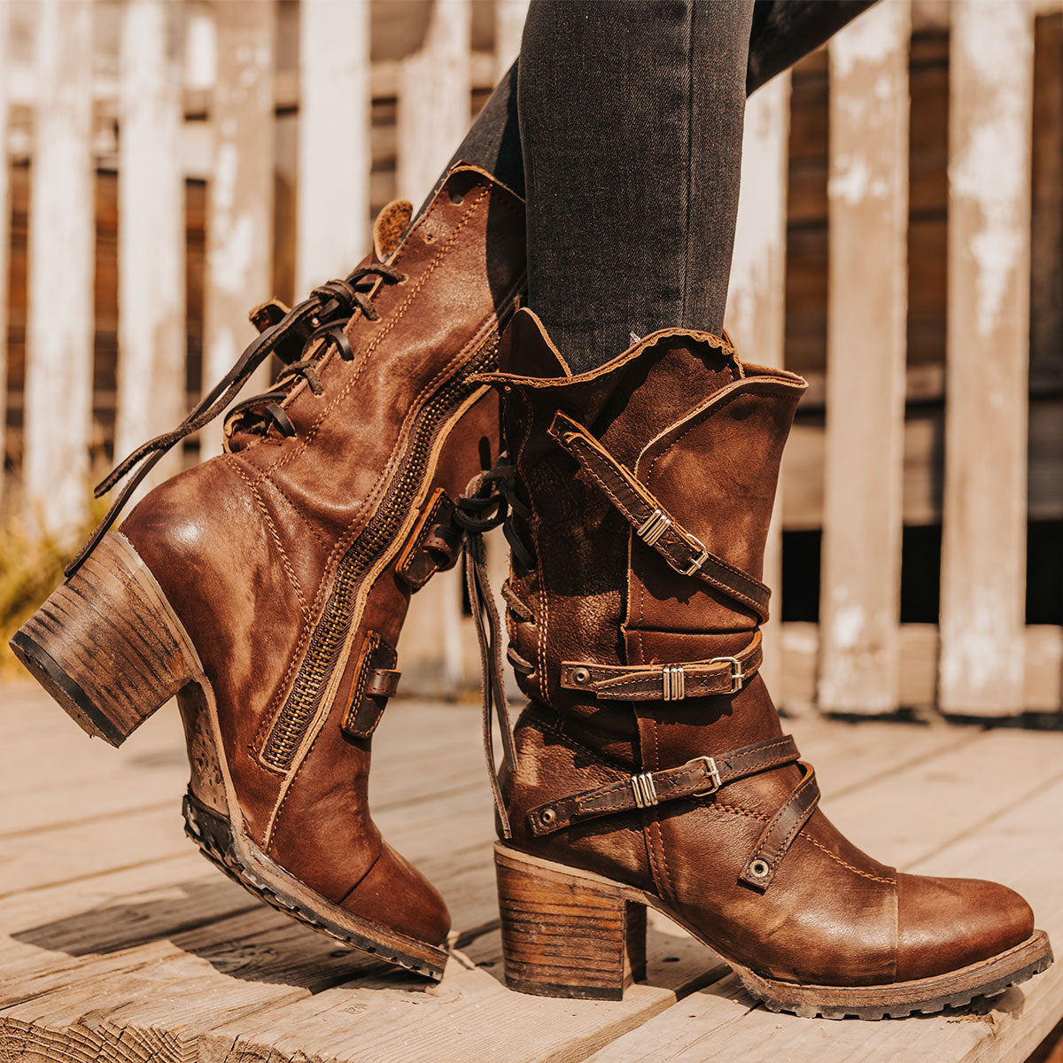 FREEBIRD women’s Cora brown slouchy back lacing leather boot with adjustable straps and buckles