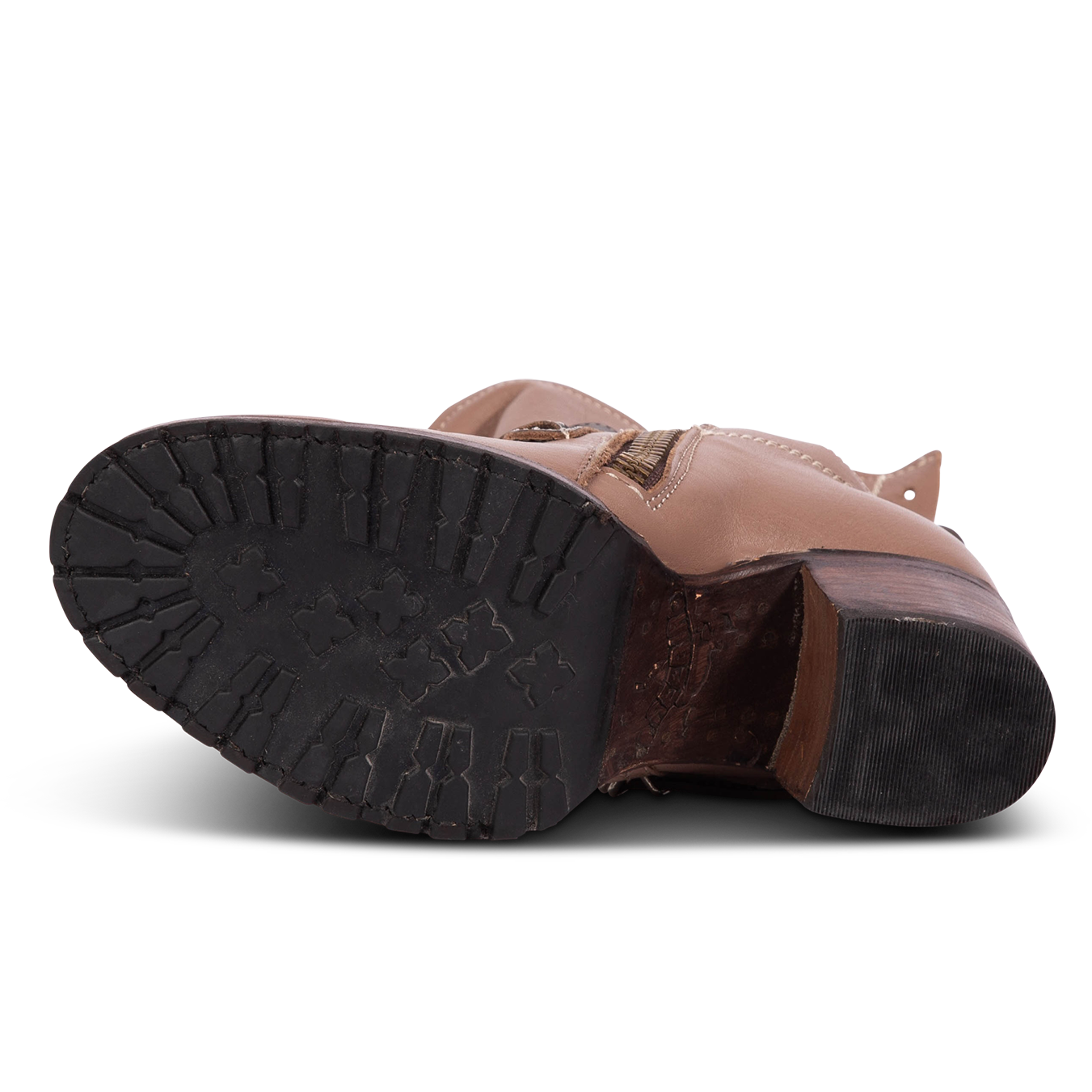 Tread sole imprinted with FREEBIRD on women's CORA clay leather boot