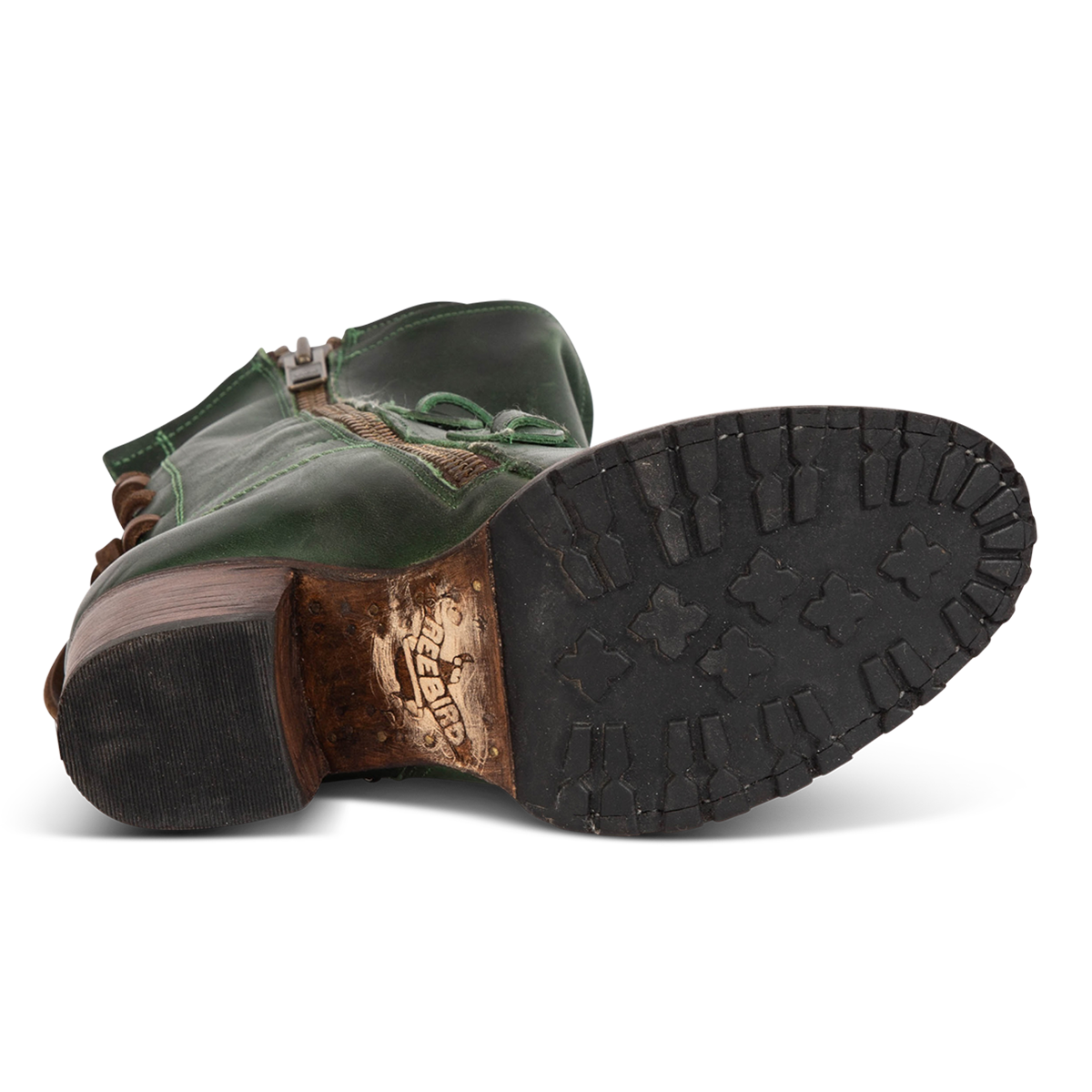 Tread sole imprinted with FREEBIRD on women's CORA Green leather boot