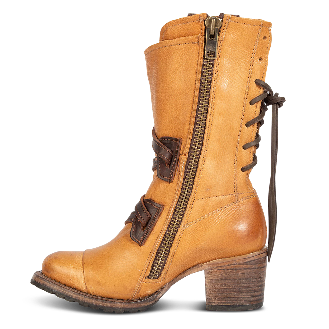 Inside view showing working brass zip closure and wood wrapped heel on FREEBIRD women's Cora tan leather boot