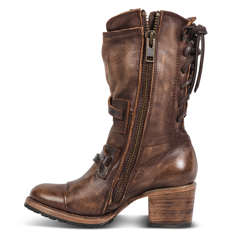 Inside view showing working brass zip closure and wood wrapped heel on FREEBIRD women's Cora brown leather boot