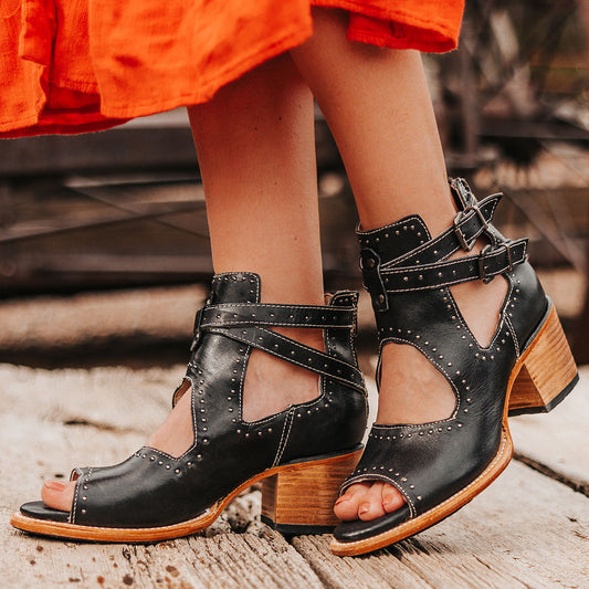 FREEBIRD women's Cosmic black leather sandal with a block heel, open-toe silhouette and stud embossments