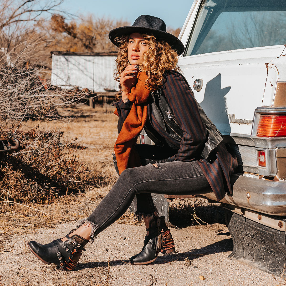 FREEBIRD women's Crue black multi leather cutout ankle bootie with silver hardware straps and back lacing detail lifestyle