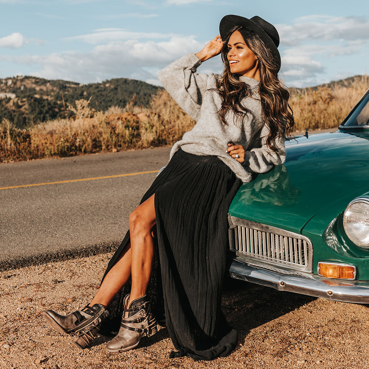 FREEBIRD women's Crue grey multi leather cutout ankle bootie with silver hardware straps and back lacing detail  lifestyle image