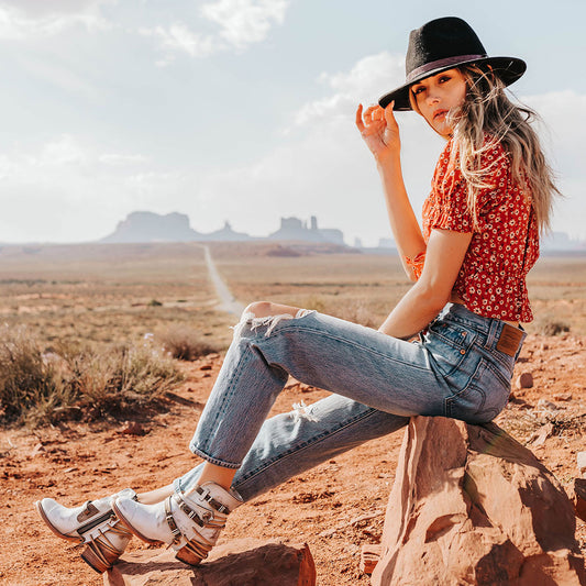 FREEBIRD women's Crue ice leather cutout ankle bootie with silver hardware straps and back lacing detail lifestyle