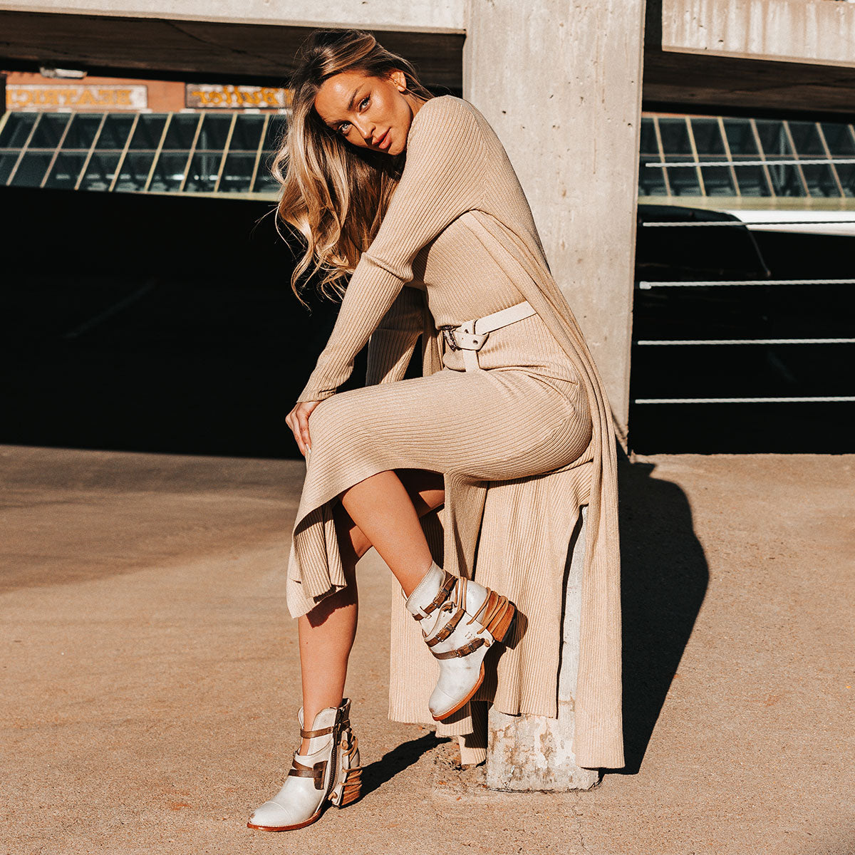 FREEBIRD women's Crue ice leather cutout ankle bootie with silver hardware straps and back lacing detail lifestyle image