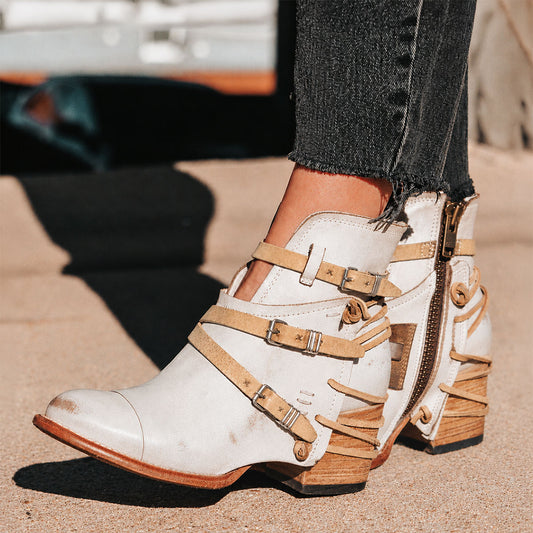FREEBIRD women's Crue ice leather cutout ankle bootie with silver hardware straps and back lacing detail 