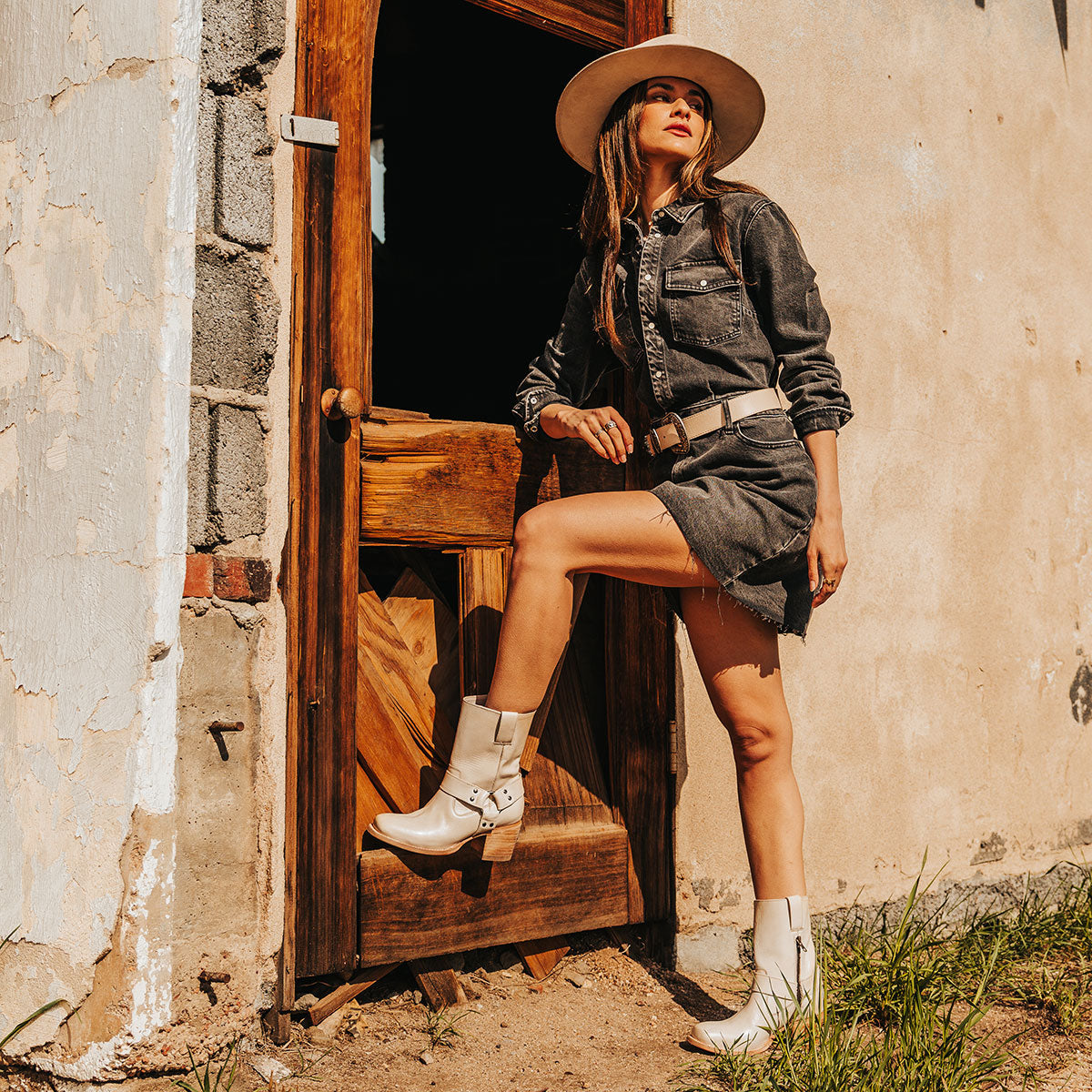 FREEBIRD women's Darcy beige leather boot with a studded ankle harness, leather pull straps, an inside zip closure and a square toe lifestyle image