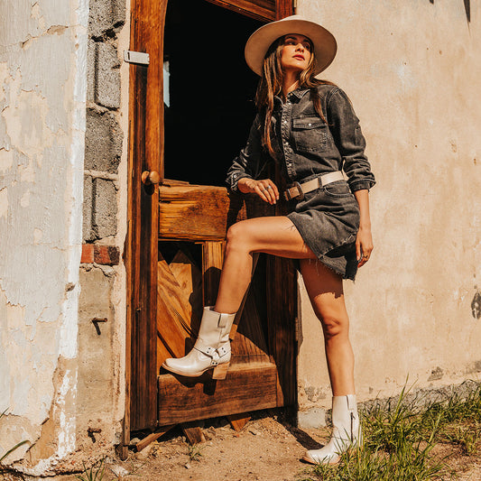 FREEBIRD women's Darcy beige leather boot with a studded ankle harness, leather pull straps, an inside zip closure and a square toe lifestyle image